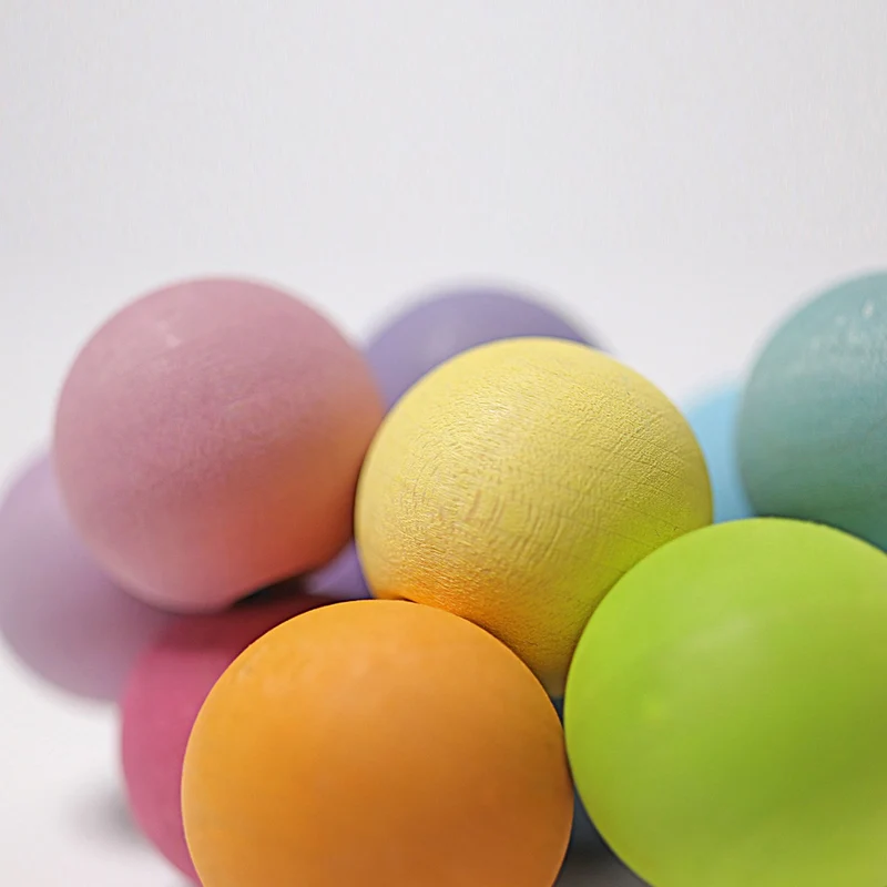 Greifling Regenbogen, pastell, Holz | Grimms