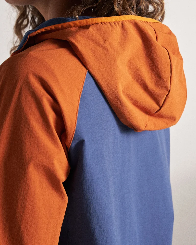 Ocean Light Softshell Anorak - Dunkles Denim/Sonnenuntergangs-Orange