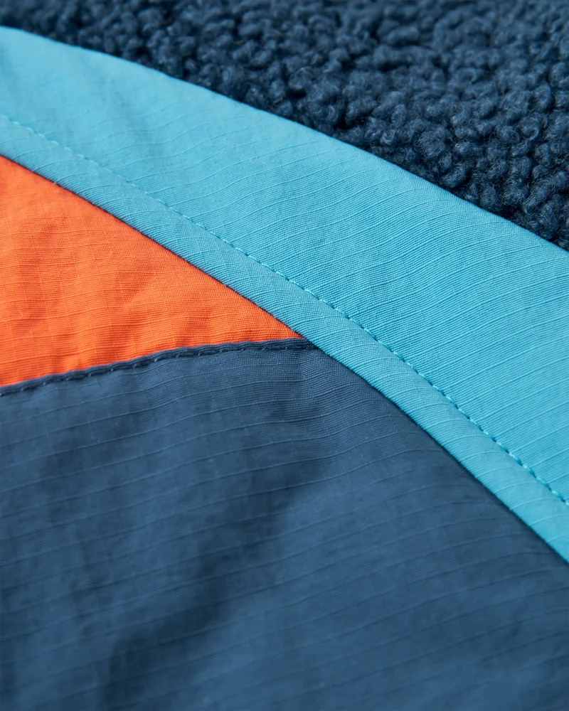 Lara Steppjacke - Tiefes Marineblau/Glutorange