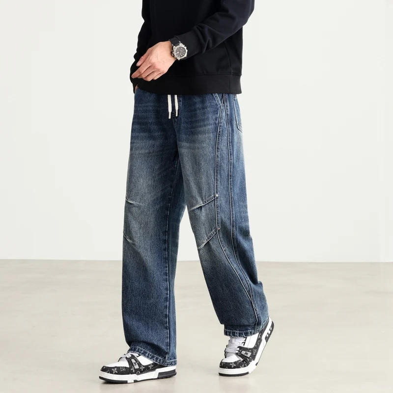 Herren Weite Denim-Hose mit Tunnelzugbund, Paneelnähten und Used-Waschung Drune