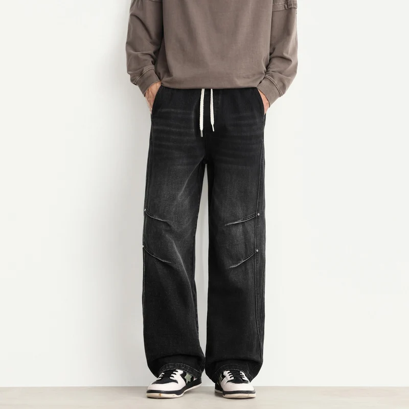 Herren Weite Denim-Hose mit Tunnelzugbund, Paneelnähten und Used-Waschung Drune