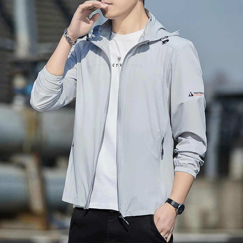 Herren Ultraleichte Wind- und Regenjacke mit Kapuze, Packfunktion und Reißverschlusstaschen Drune