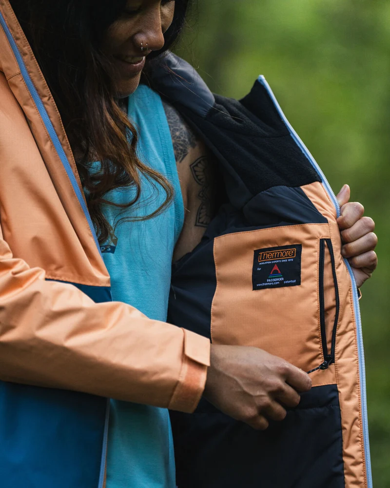 Terrain isolierte wasserabweisende Jacke - Korsarblau/Aprikose