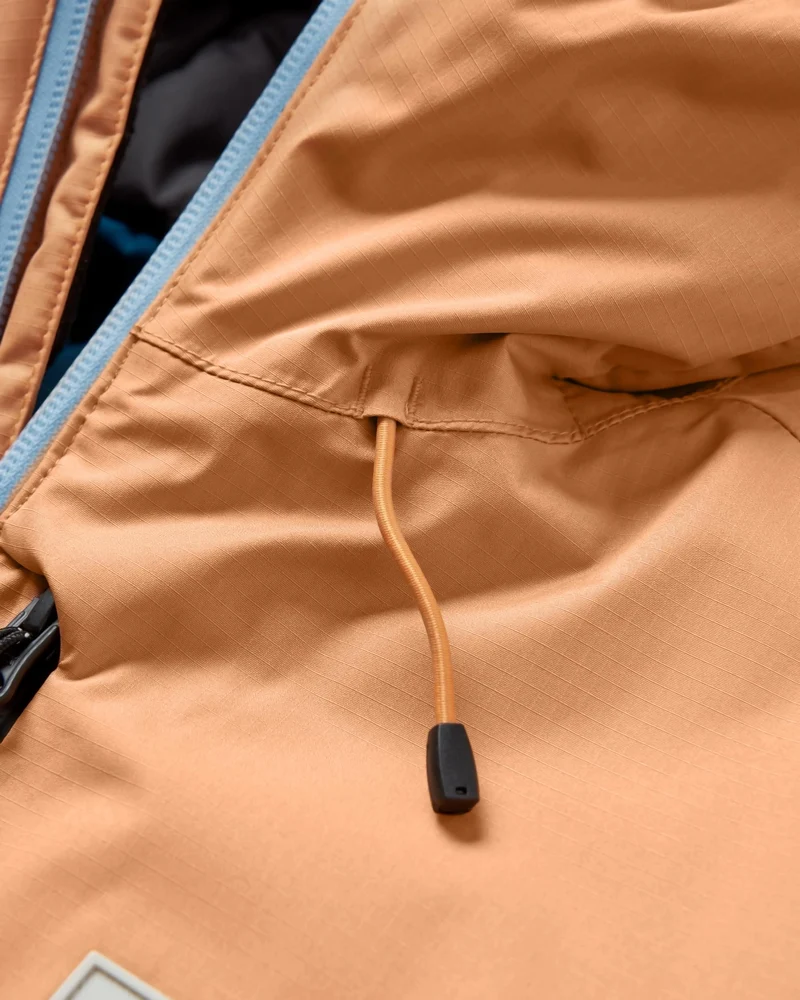 Terrain isolierte wasserabweisende Jacke - Korsarblau/Aprikose
