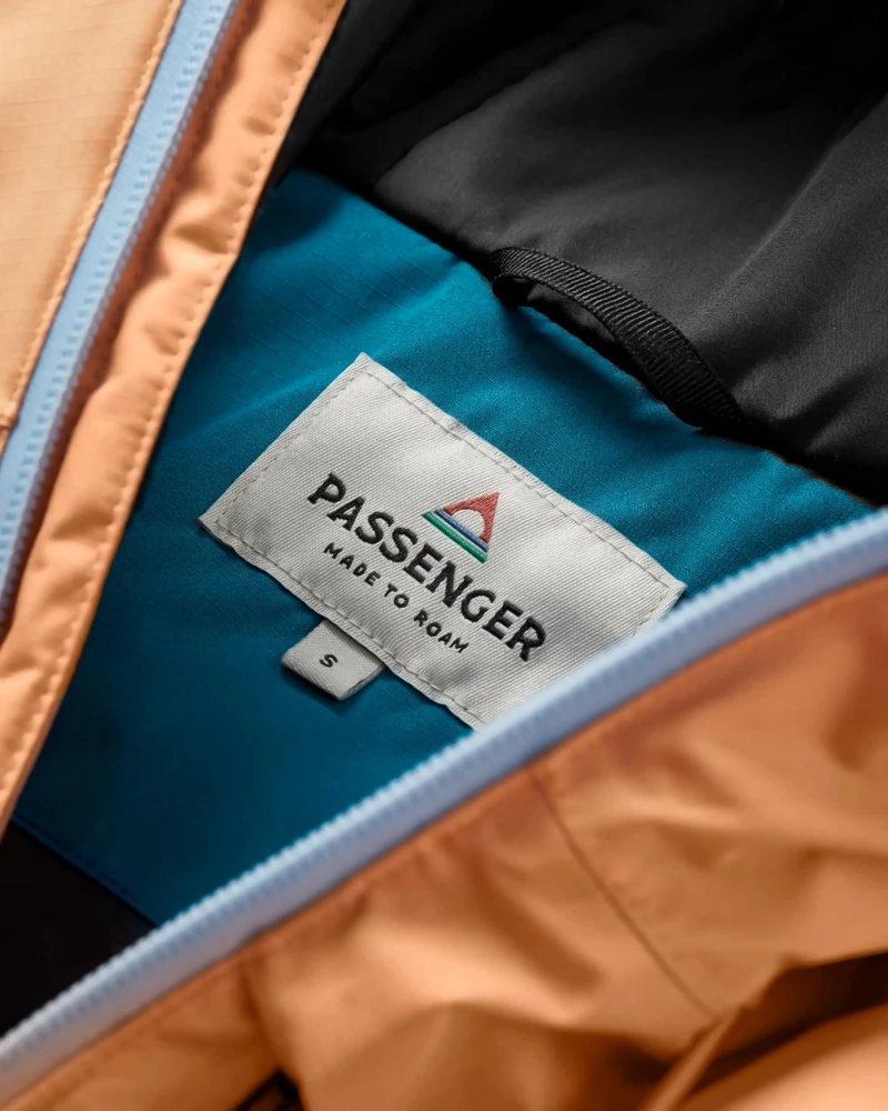 Terrain isolierte wasserabweisende Jacke - Korsarblau/Aprikose