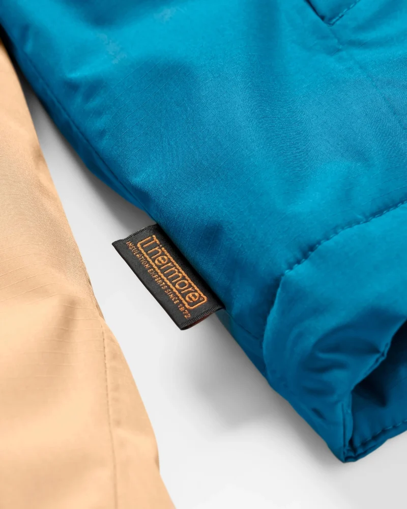 Terrain isolierte wasserabweisende Jacke - Korsarblau/Aprikose