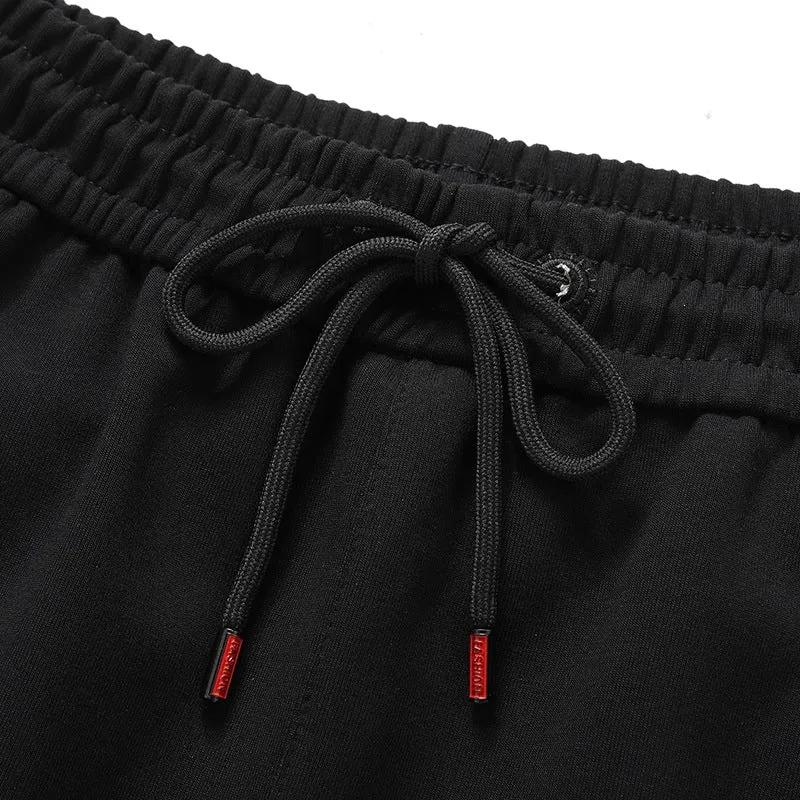 Herren Sportliche konisch zulaufende Jogginghose mit Elastbund, Kordelzug & Reißverschlusstaschen Drune