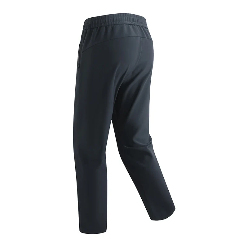 Herren Slim-Tapered Performance-Jogginghose aus wasserabweisendem Funktionsstoff mit elastischem Kordelbund & verdeckten Reißverschlusstaschen Drune