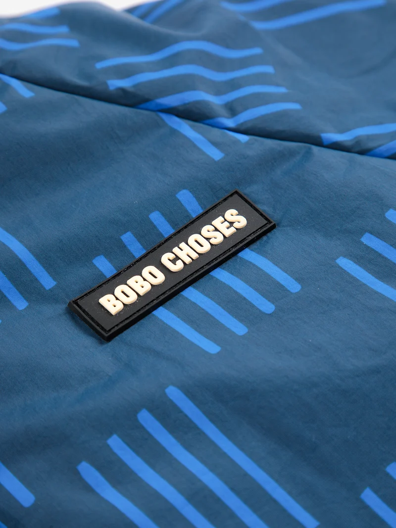 Almost Moiré all over reversible anorak