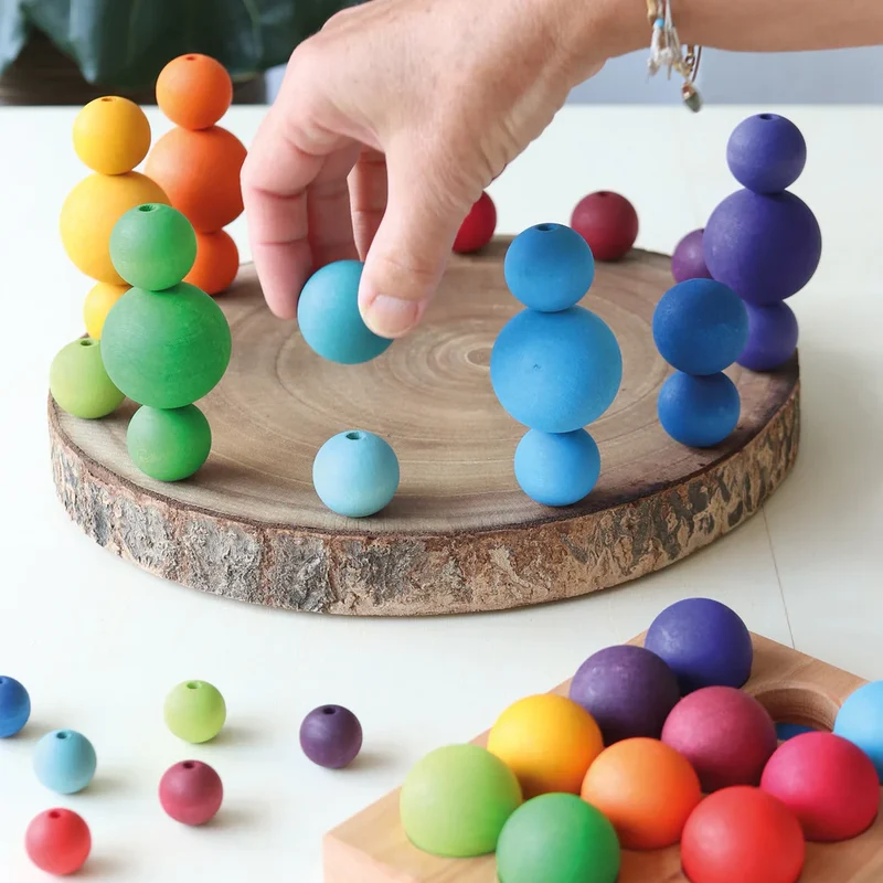 Kleine Regenbogenkugeln aus Holz | Grimms