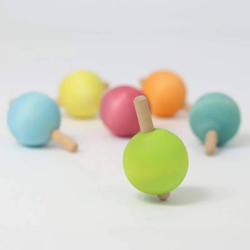 Kleine Kreisel in Pastellfarben | Grimms