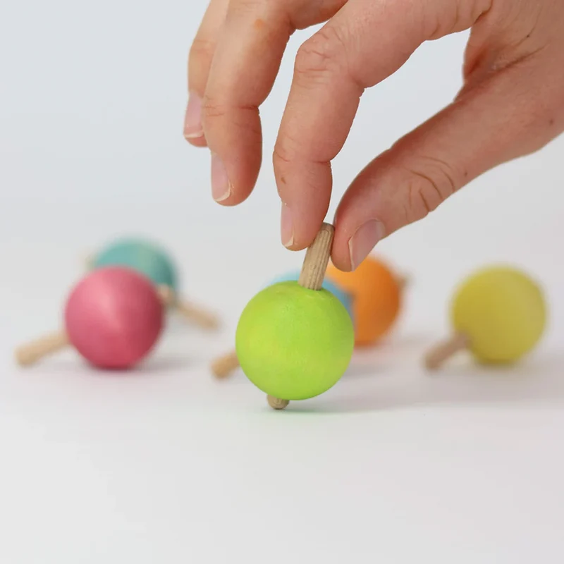 Kleine Kreisel in Pastellfarben | Grimms