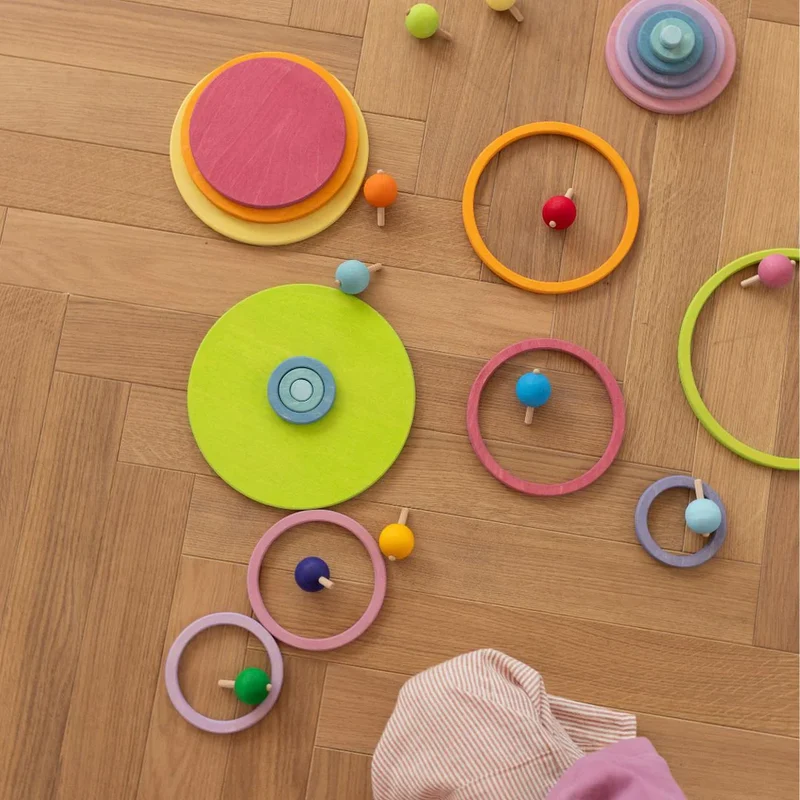 Kleine Kreisel in Pastellfarben | Grimms