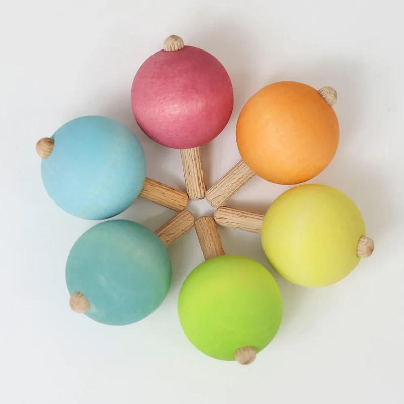 Kleine Kreisel in Pastellfarben | Grimms