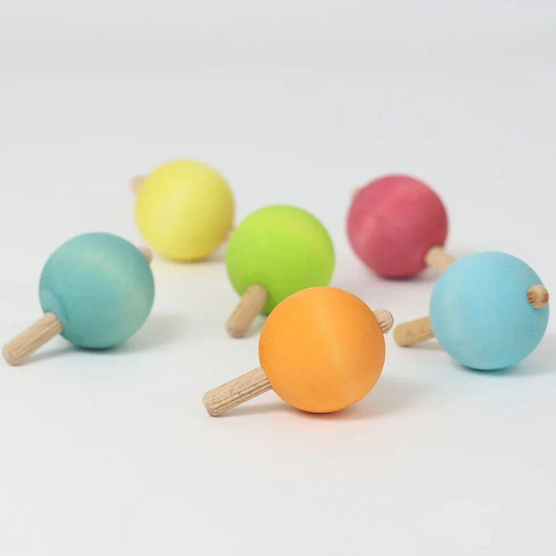 Kleine Kreisel in Pastellfarben | Grimms