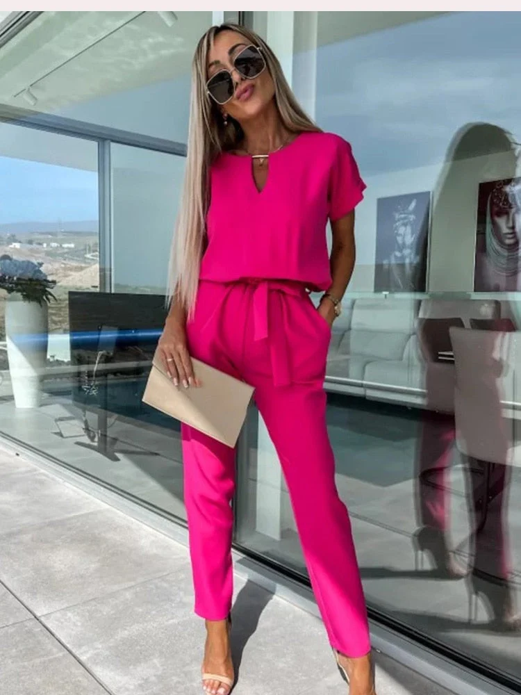 Drune | Eleganter Jumpsuit mit kurzen Ärmeln und Gürtel