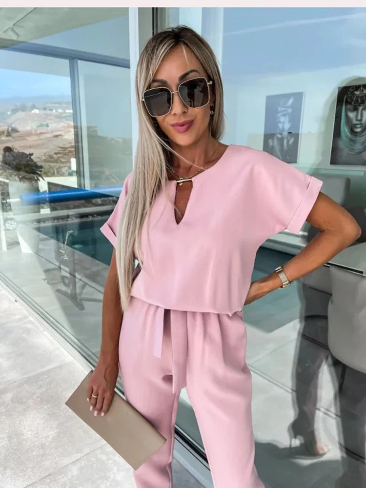 Drune | Eleganter Jumpsuit mit kurzen Ärmeln und Gürtel