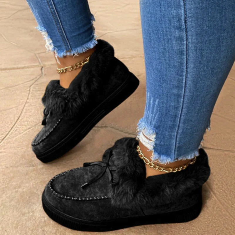 Damen Kuschel‑Mokassin‑Slipper mit hochfloriger Fellmanschette, dekorativer Steppnaht und leichtem Plateau‑Sohlenprofil Drune