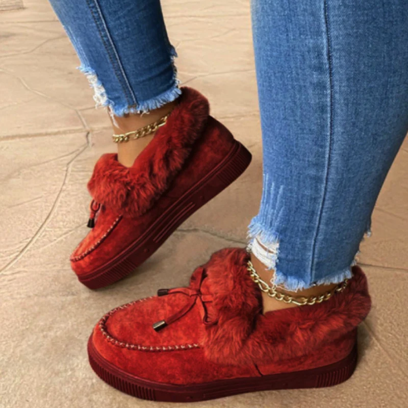 Damen Kuschel‑Mokassin‑Slipper mit hochfloriger Fellmanschette, dekorativer Steppnaht und leichtem Plateau‑Sohlenprofil Drune