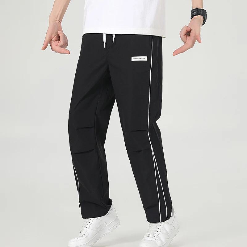 Herren Leichte Technical-Trackhose mit elastischem Bund, Knieabnähern & seitlicher Kontrastpaspel Drune