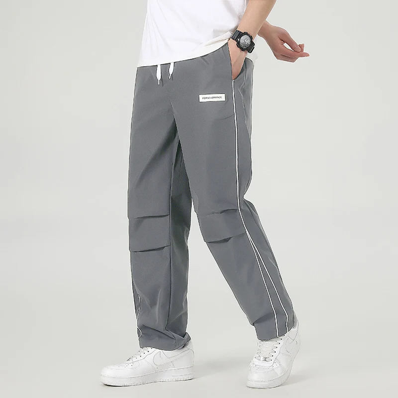 Herren Leichte Technical-Trackhose mit elastischem Bund, Knieabnähern & seitlicher Kontrastpaspel Drune