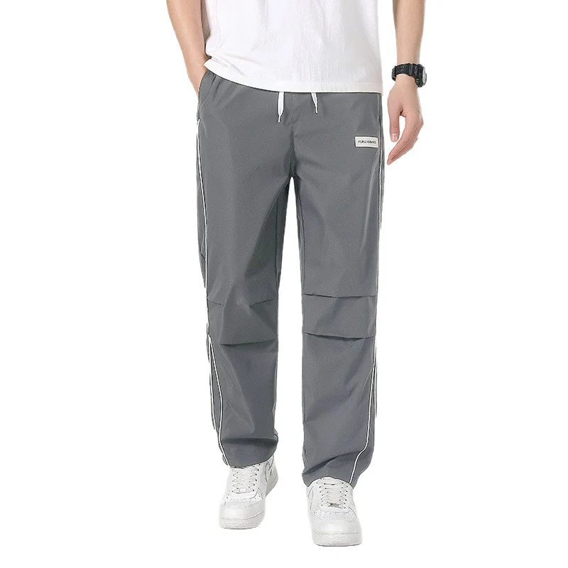 Herren Leichte Technical-Trackhose mit elastischem Bund, Knieabnähern & seitlicher Kontrastpaspel Drune