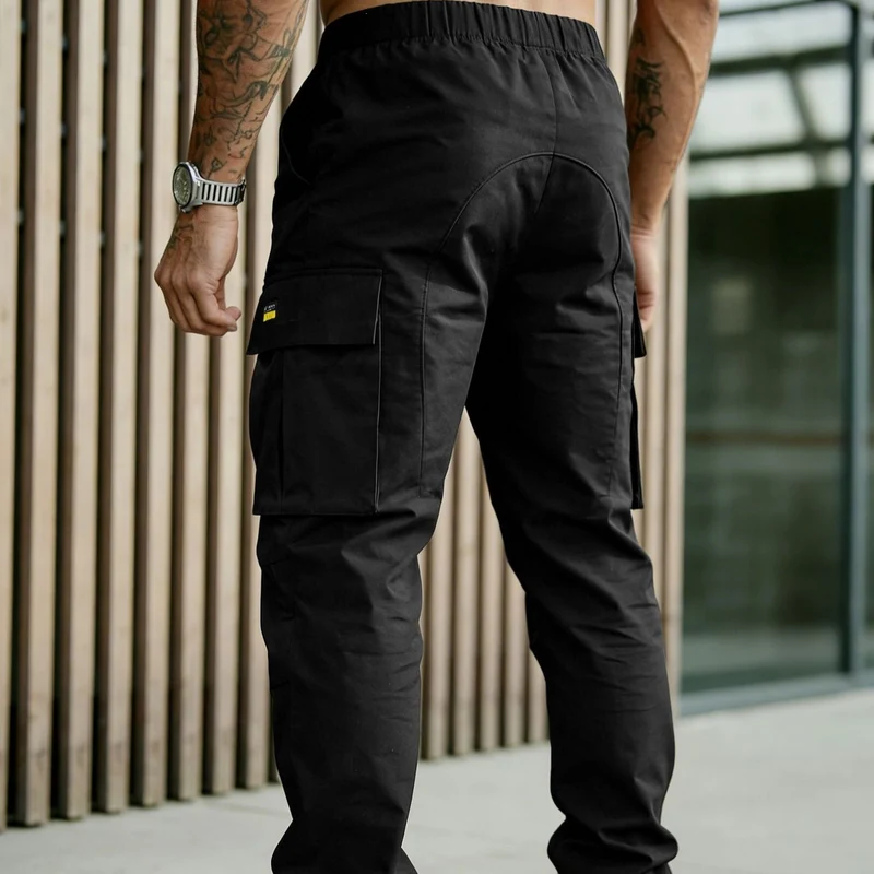 Herren Cargohose mit konisch zulaufendem Bein und Multifunktions‑Taschen Drune