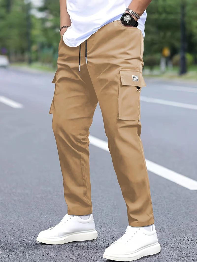 Herren Cargohose konisch zulaufend im Joggerstil mit Tunnelzug, Klappfächern & D‑Ring Drune