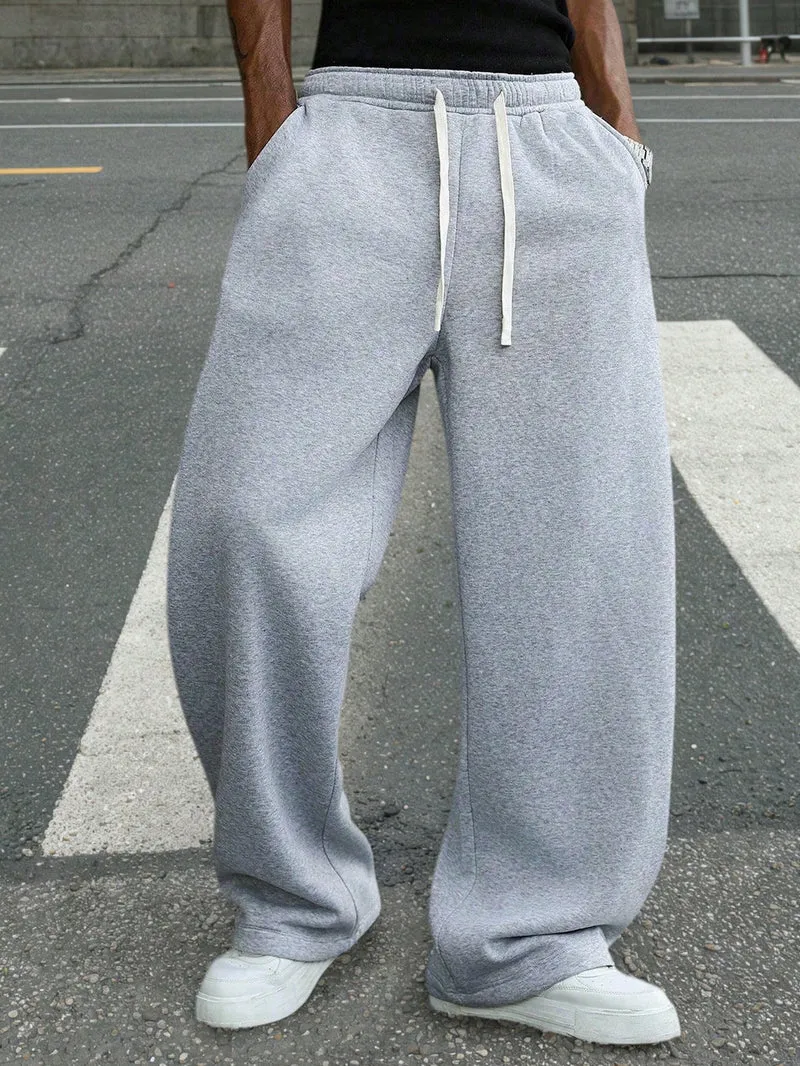 Herren Baggy-Jogginghose im Urban-Utility-Stil mit extra weitem Bein und sichtbarem Kordelzug Drune
