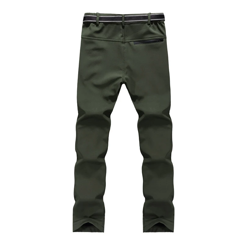 Damen Softshell-Trekkinghose mit vorgeformten Kniepartien, wasserabweisender Membran und Reißverschlusstaschen Drune