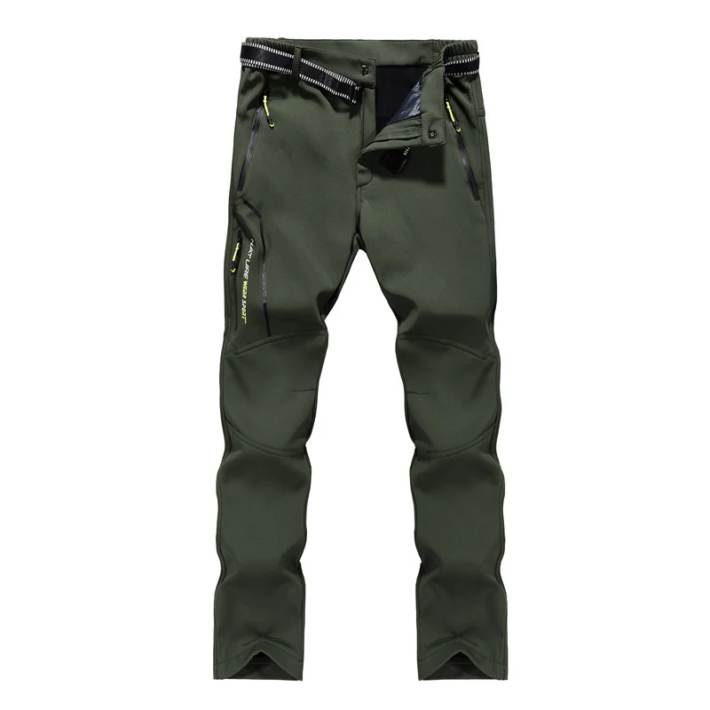 Damen Softshell-Trekkinghose mit vorgeformten Kniepartien, wasserabweisender Membran und Reißverschlusstaschen Drune