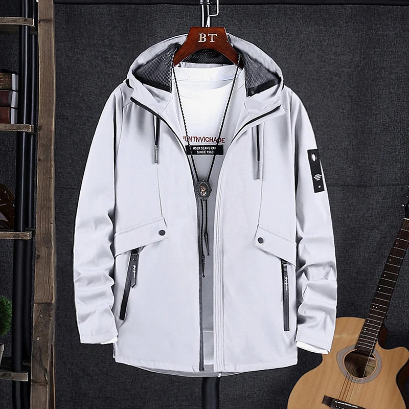 Herren wind- und wasserabweisende Softshell-Fieldjacke mit Mesh-Kapuzenfutter und verdeckten Reißverschlusstaschen Drune