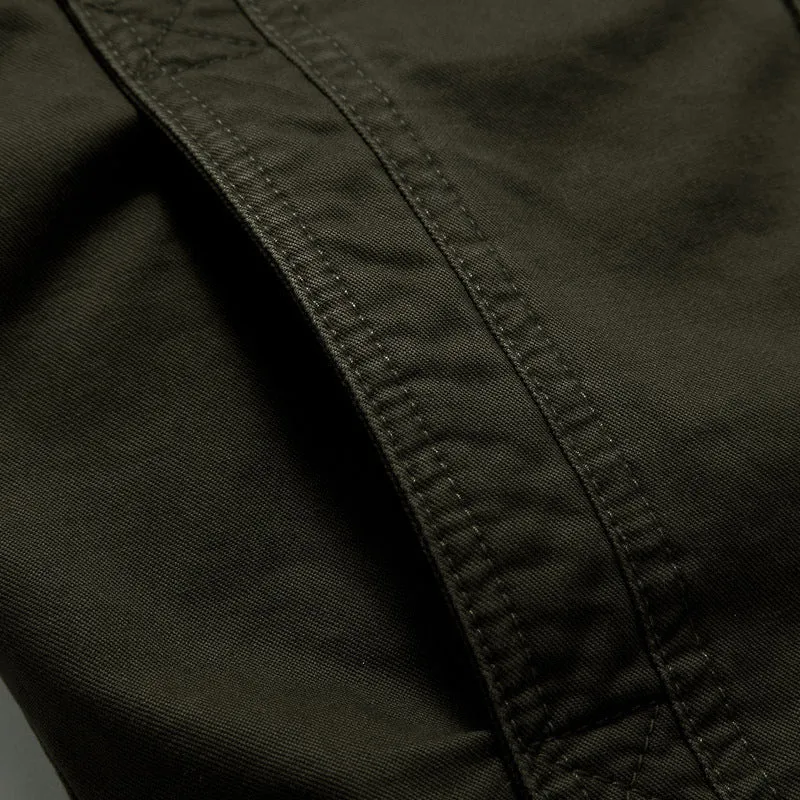 Herren Urbaner Canvas‑Militärblouson mit hohem Kragen, Schulterepauletten und Multifunktions‑Taschen Drune