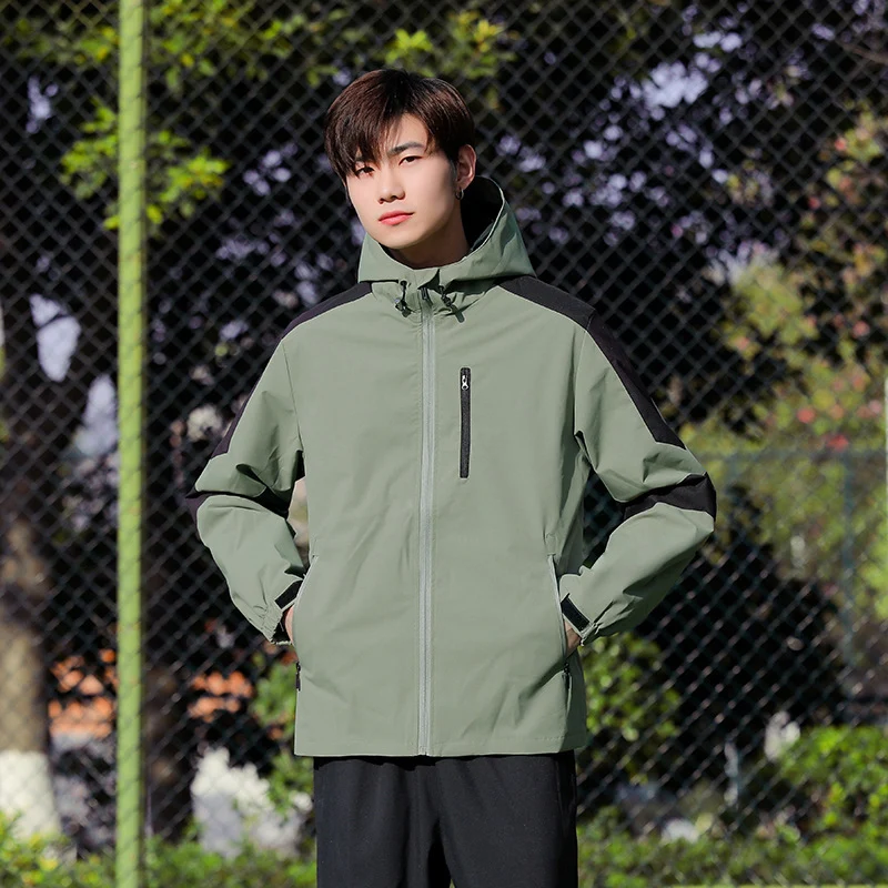 Herren Sportliche Softshell-Outdoorjacke mit Kapuze, Colorblock-Ärmel und wasserabweisender Membran Drune