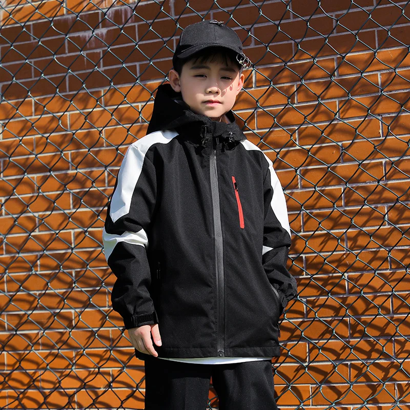 Herren Sportliche Softshell-Outdoorjacke mit Kapuze, Colorblock-Ärmel und wasserabweisender Membran Drune