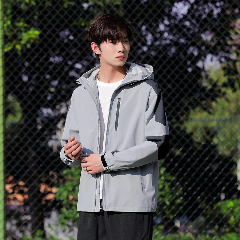 Herren Sportliche Softshell-Outdoorjacke mit Kapuze, Colorblock-Ärmel und wasserabweisender Membran Drune