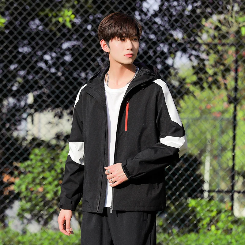 Herren Sportliche Softshell-Outdoorjacke mit Kapuze, Colorblock-Ärmel und wasserabweisender Membran Drune