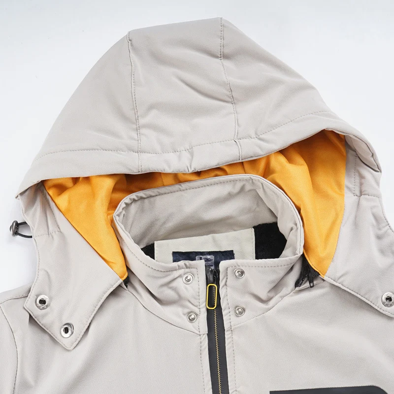 Herren sportliche Softshell-Hybridjacke mit Kapuze, wasserabweisenden Reißverschlüssen und ergonomischer Passform Drune