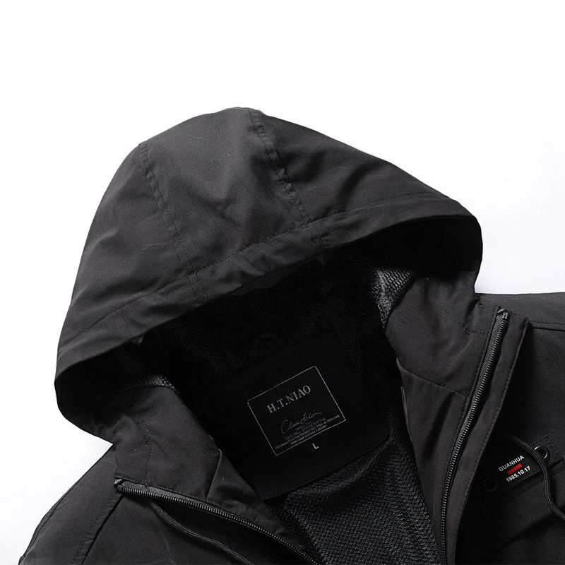 Herren Softshell-Jacke mit Kapuze, winddichtem Außenmaterial und atmungsaktivem Meshfutter Drune