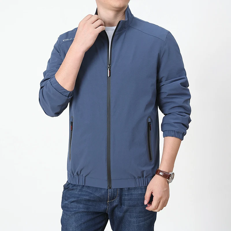 Herren leichte Softshell-Outdoorjacke mit Stehkragen wasserabweisender Oberfläche und Reißverschlusstaschen Drune