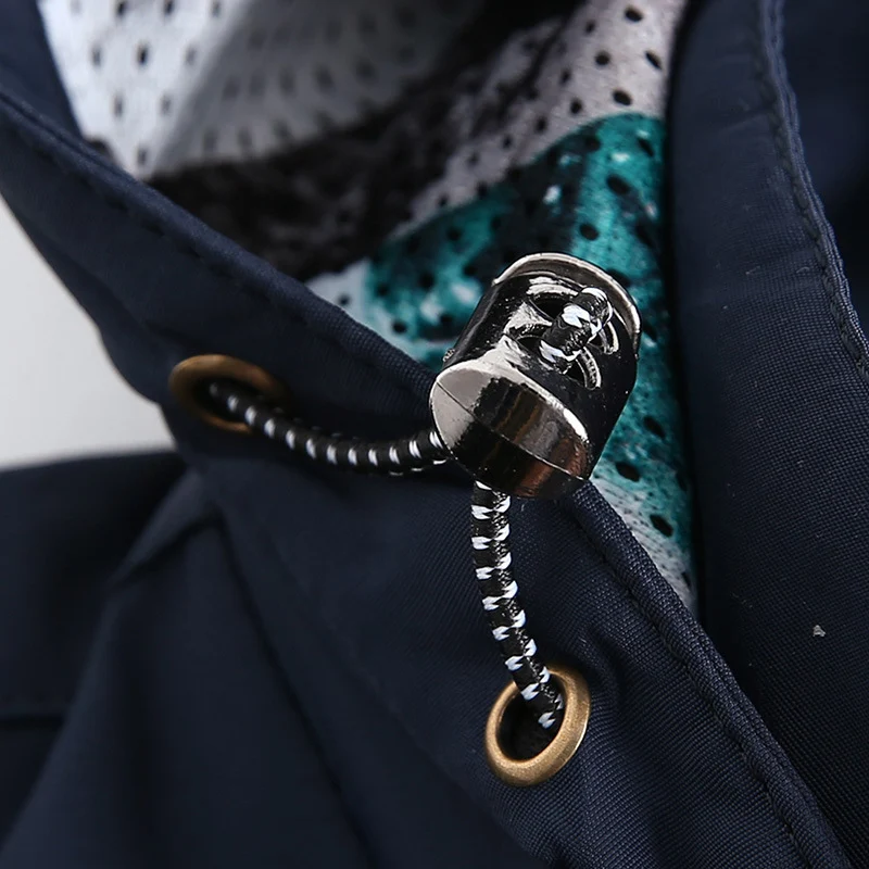 Herren leichte wasserabweisende Softshell-Kapuzenjacke mit Reißverschlusstaschen und Ärmeldetail Drune