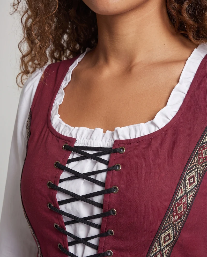 Frauen traditionelle Kleid mit dekorativer Schnürung und bunten Stickdetails Drune