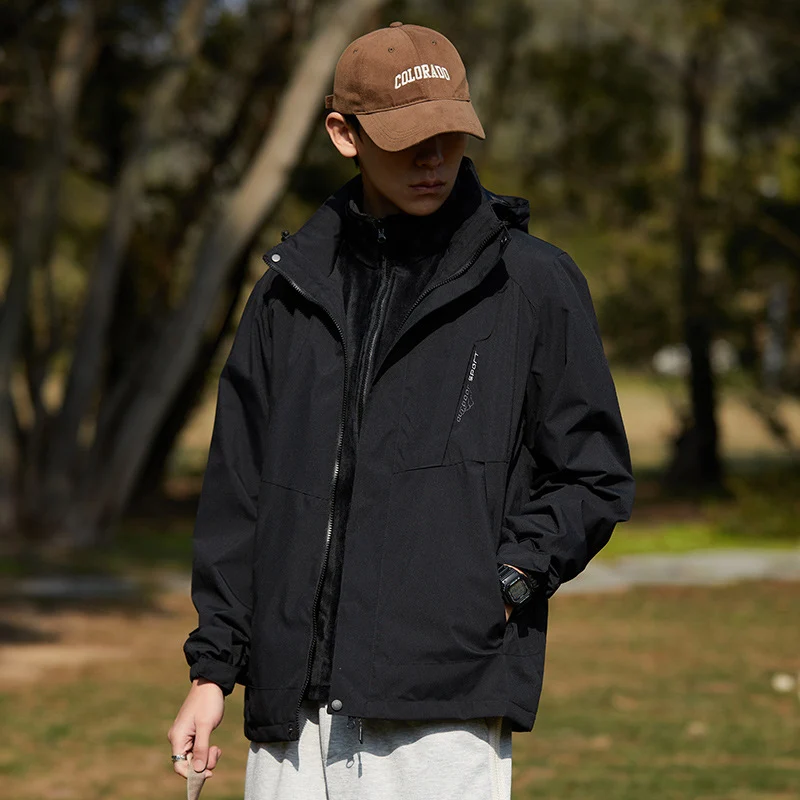 Damen zweilagige wasserabweisende Outdoorjacke mit Kapuze, Taillenregulierung und Kontrastbesätzen Drune