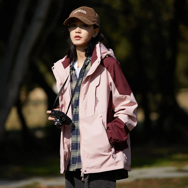 Damen zweilagige wasserabweisende Outdoorjacke mit Kapuze, Taillenregulierung und Kontrastbesätzen Drune