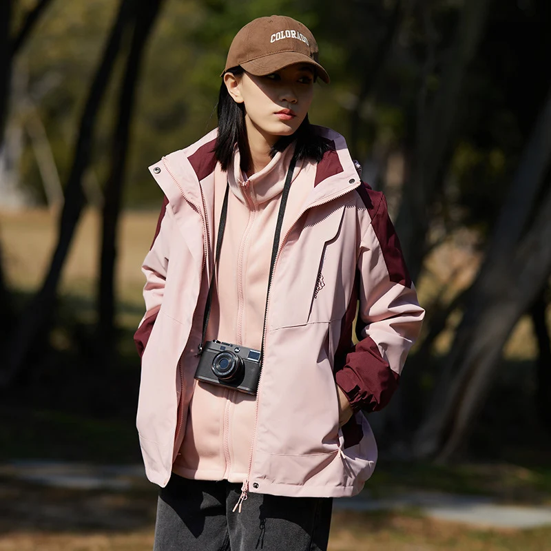 Damen zweilagige wasserabweisende Outdoorjacke mit Kapuze, Taillenregulierung und Kontrastbesätzen Drune