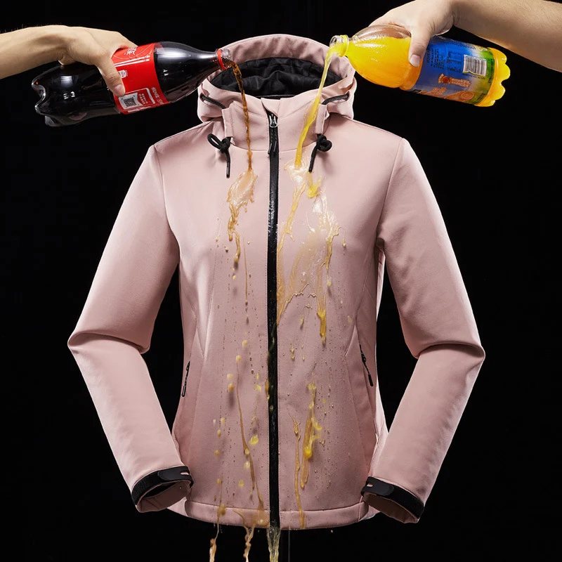 Damen taillierte Softshelljacke mit Kapuze und wasserabweisender Membran Drune