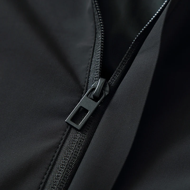 Herren Ultraleichte Wind- und Wasserabweisende Softshelljacke mit Kapuze, verdecktem Reißverschluss und elastischen Bündchen Drune