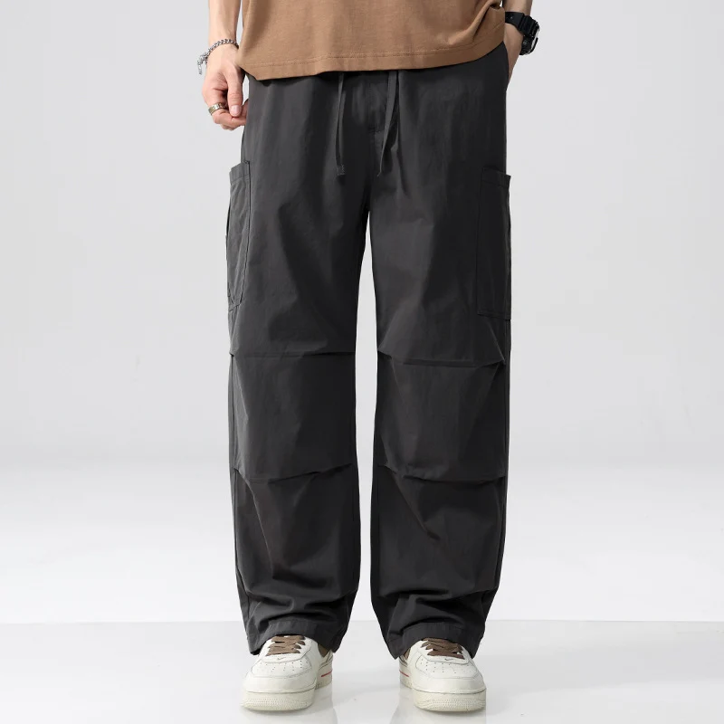 Herren Weite Cargohose im Utility‑Stil mit Kordelzug und aufgesetzten Beintaschen Drune