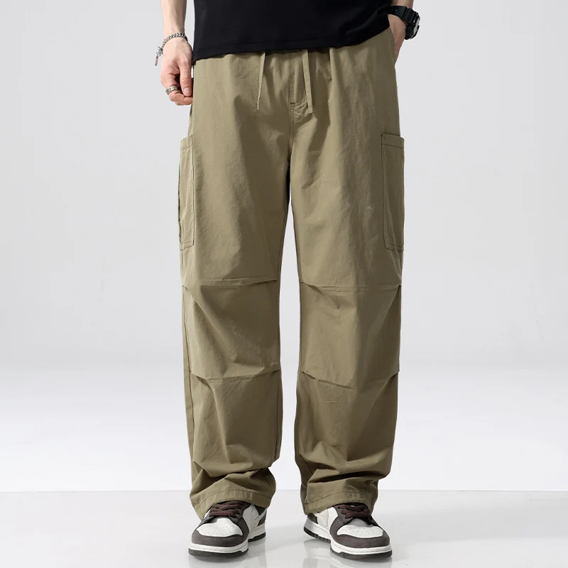 Herren Weite Cargohose im Utility‑Stil mit Kordelzug und aufgesetzten Beintaschen Drune