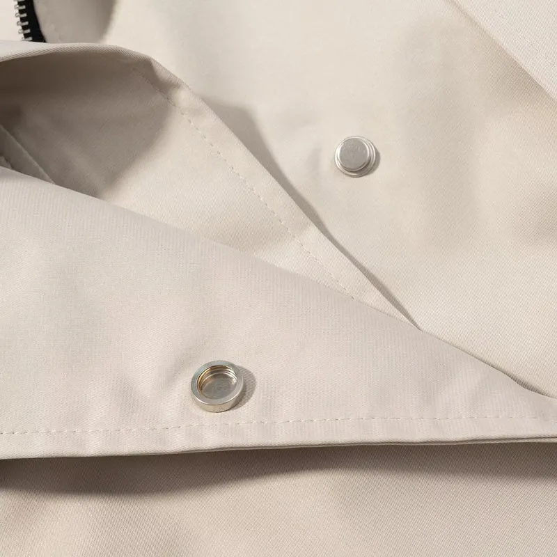 Damen Kurztrench mit Cape-Schulter, hohem Stehkragen und Bindegürtel Drune